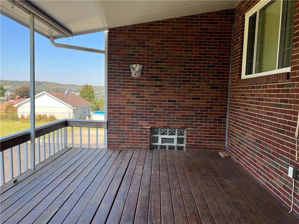 233 Reed Street Lower Burrell, PA 15068 - Photo 17 of 40 Back covered deck from the sun room.