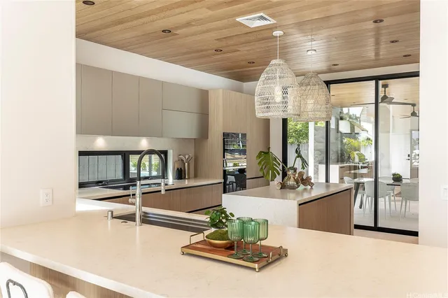 a room with lots of counter top space and furniture