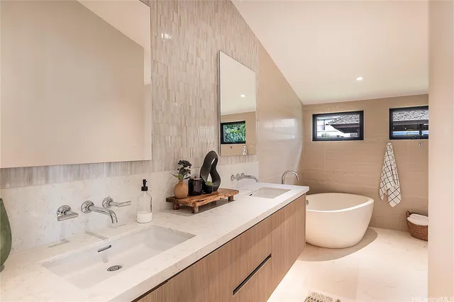 a bathroom with a toilet sink and tub