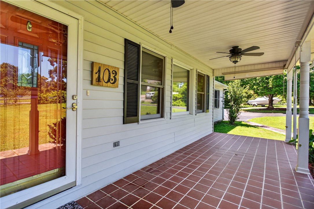 103 Dorsey Lane Walhalla, SC 29691 - Photo 24 of 42 A classic front porch with patterned tile flooring welcomes visitors to this charming residence.