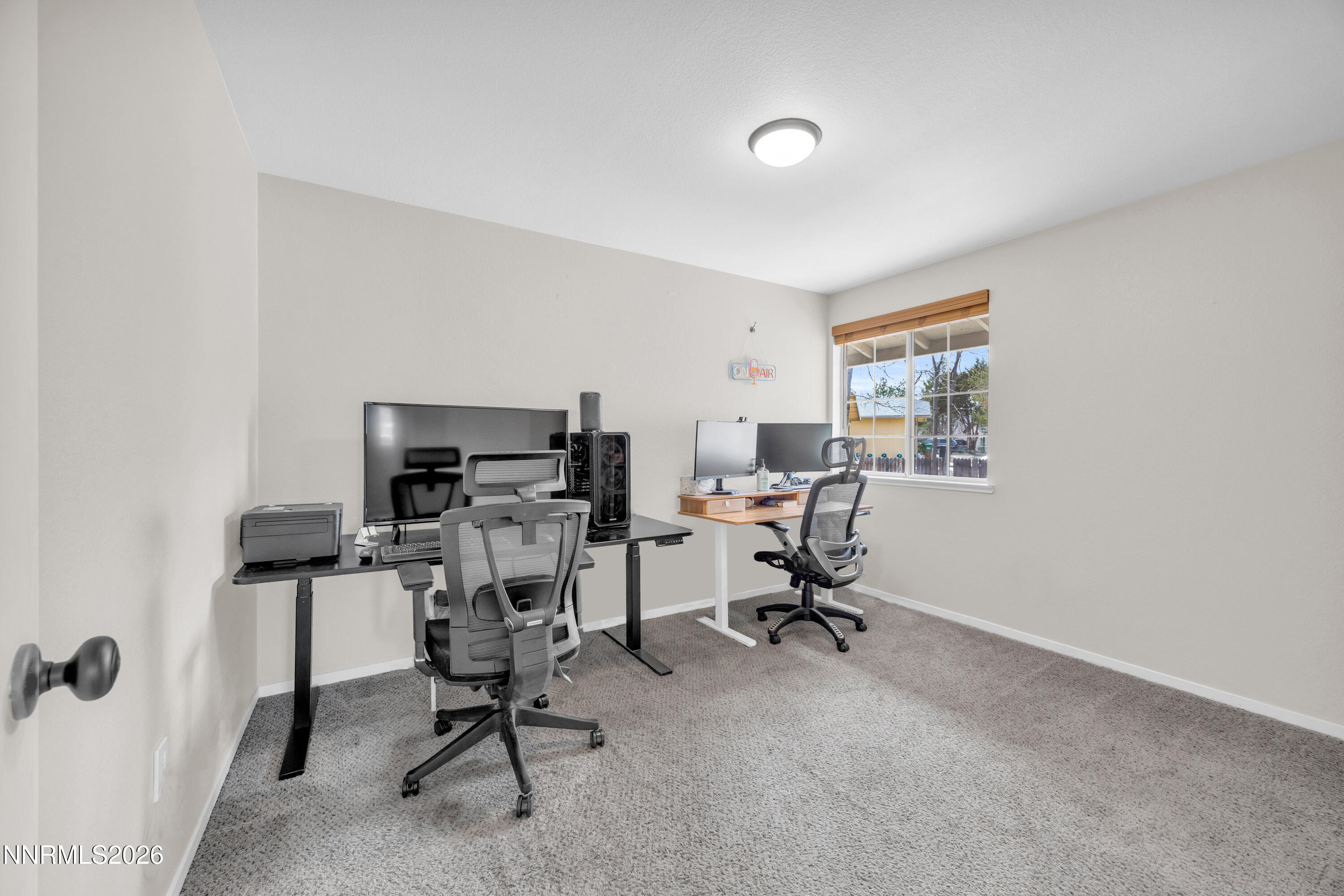 702 Ophir Court Dayton, NV 89403 - Photo 19 of 29 a view of a workspace with furniture