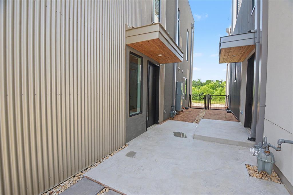1111 Raiford Road, Unit 104 Carrollton, TX 75007 - Photo 24 of 30 a entryway view with a garden space