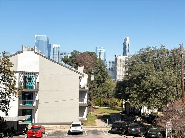 a view of a city street from a balcony