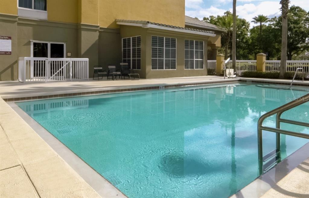 3000 Maingate Lane, Unit 522 Kissimmee, FL 34747 - Photo 14 of 14 a house view with swimming pool in front of it