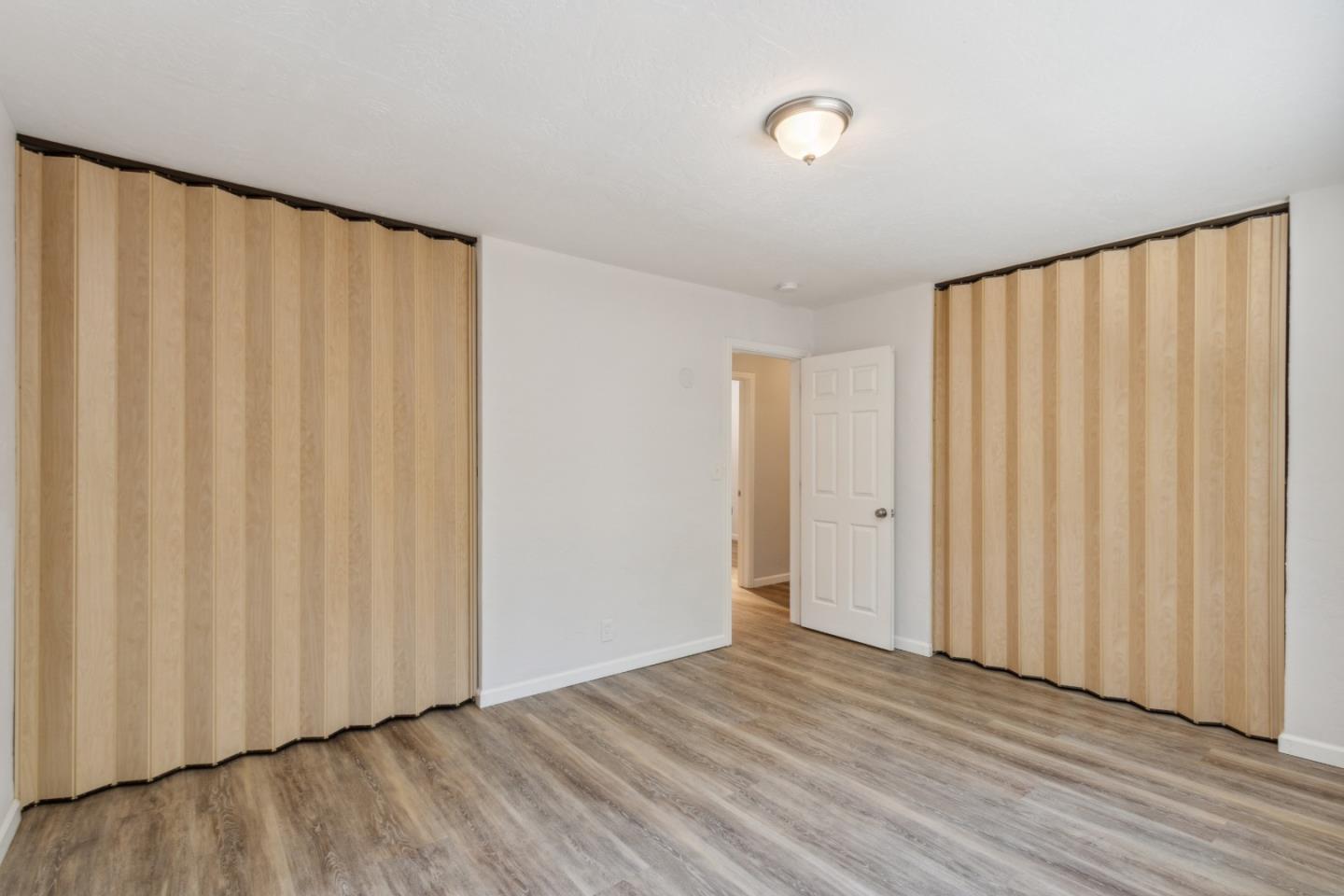 24895 Skyland Road Los Gatos, CA 95033 - Photo 42 of 113 a view of a room with wooden floor