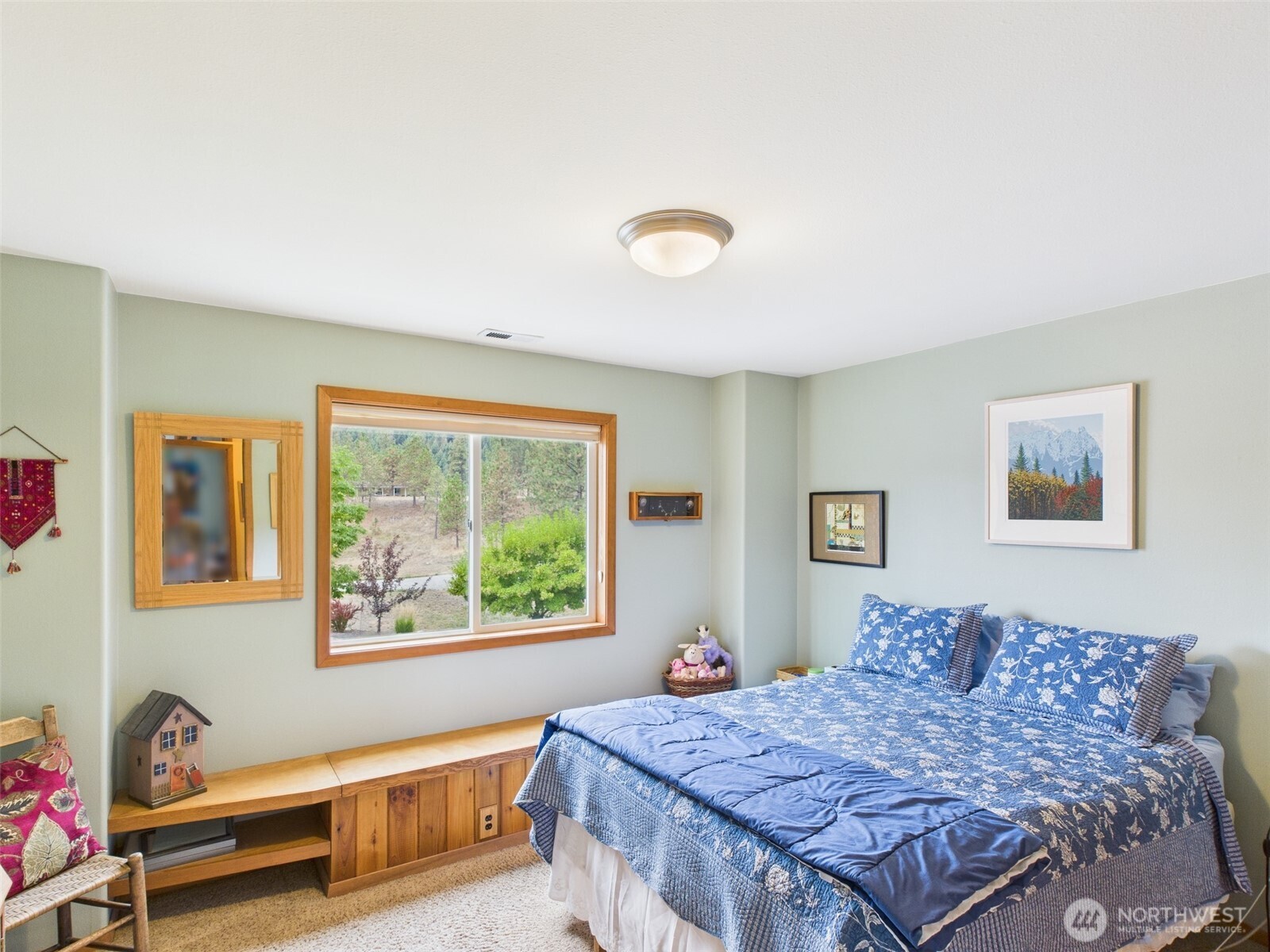 154 West Curlew Lake Road Republic, WA 99166 - Photo 12 of 28 a bedroom with a bed and a window