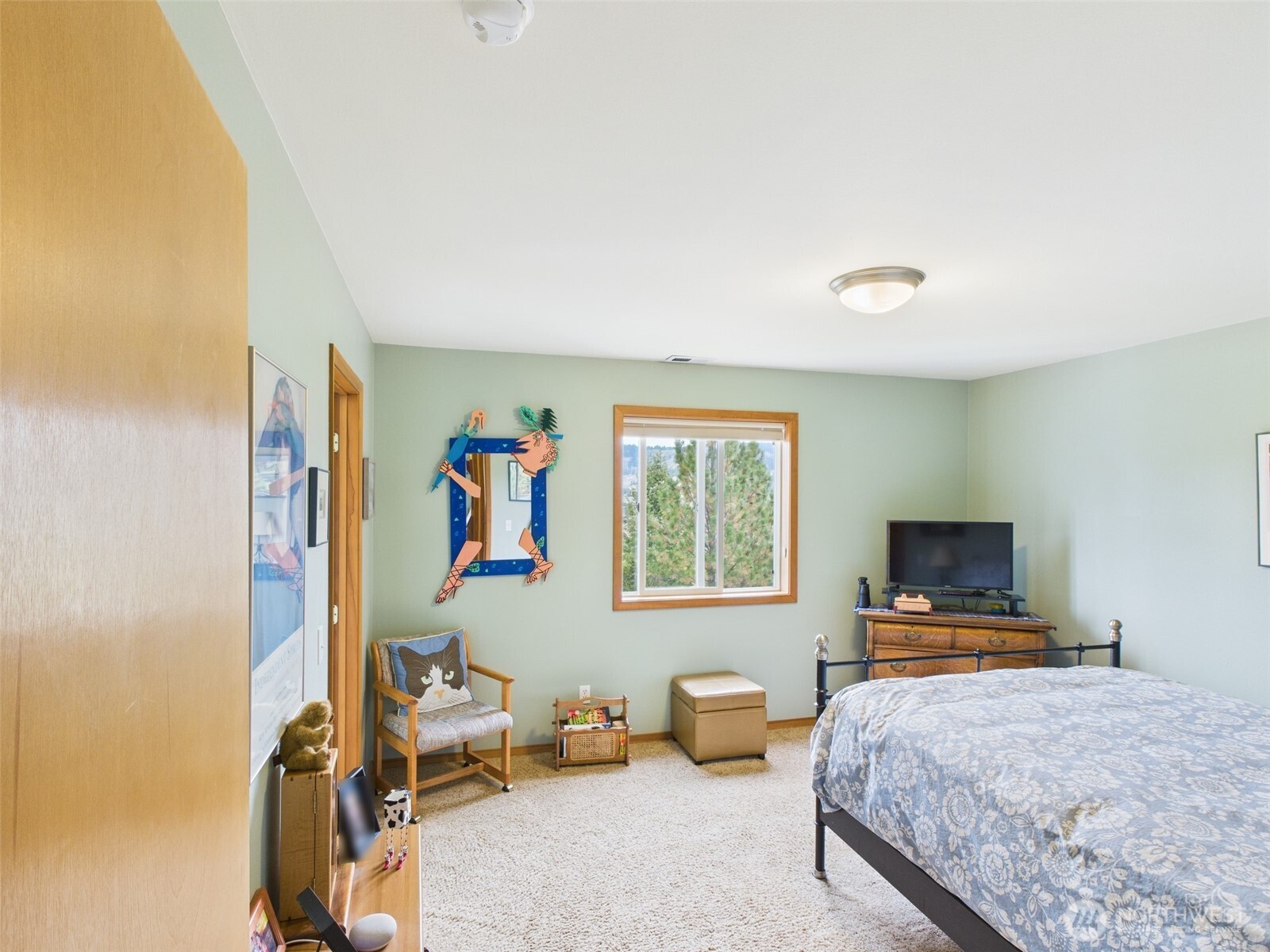 154 West Curlew Lake Road Republic, WA 99166 - Photo 15 of 28 a bedroom with furniture and a window