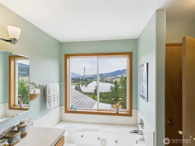 a view of a room that has a window in it