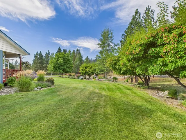 a view of a backyard with a garden