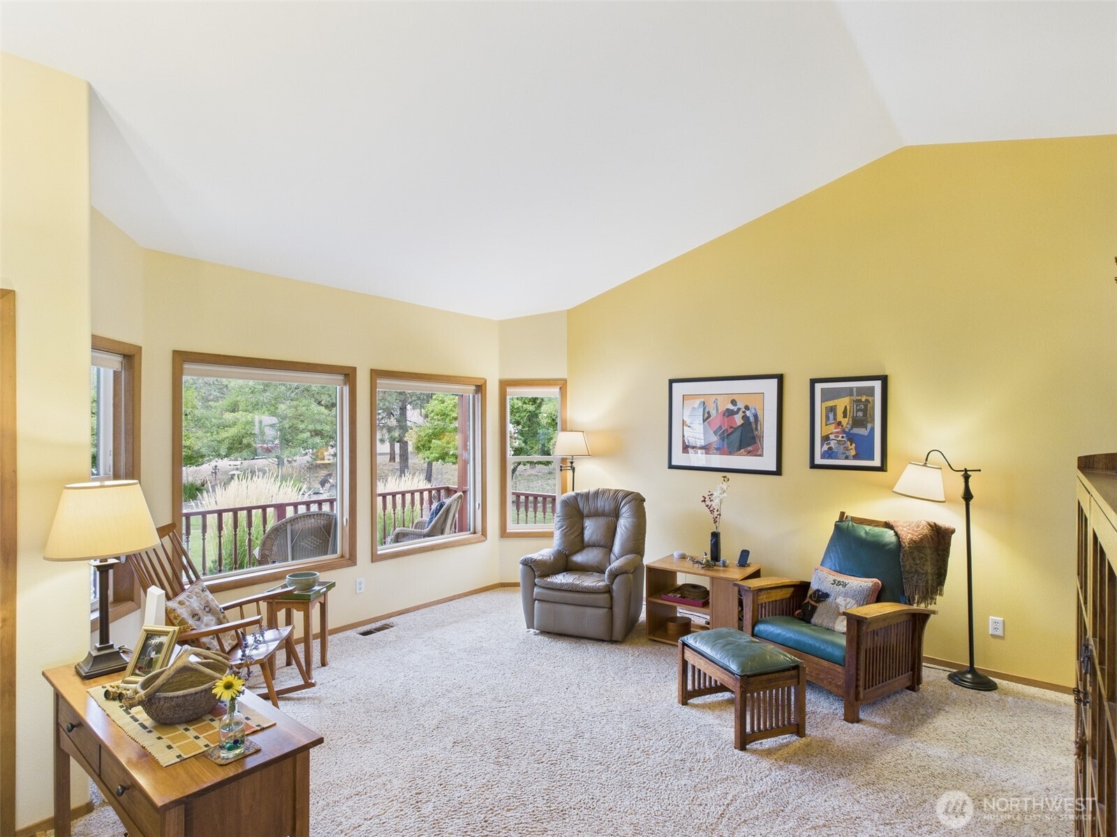 154 West Curlew Lake Road Republic, WA 99166 - Photo 6 of 28 a living room with furniture and a floor to ceiling window