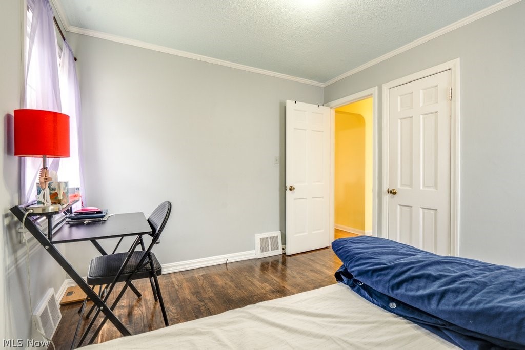 1367 Churchill Road Lyndhurst, OH 44124 - Photo 17 of 30 Room featuring custom wood-finish flooring, light grey painted walls, and white trim