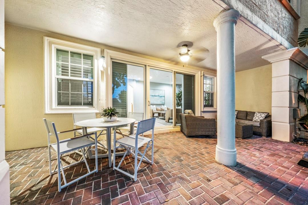 5520 Northeast Trieste Way Boca Raton, FL 33487 - Photo 56 of 57 a view of a dining room with furniture and wooden floor
