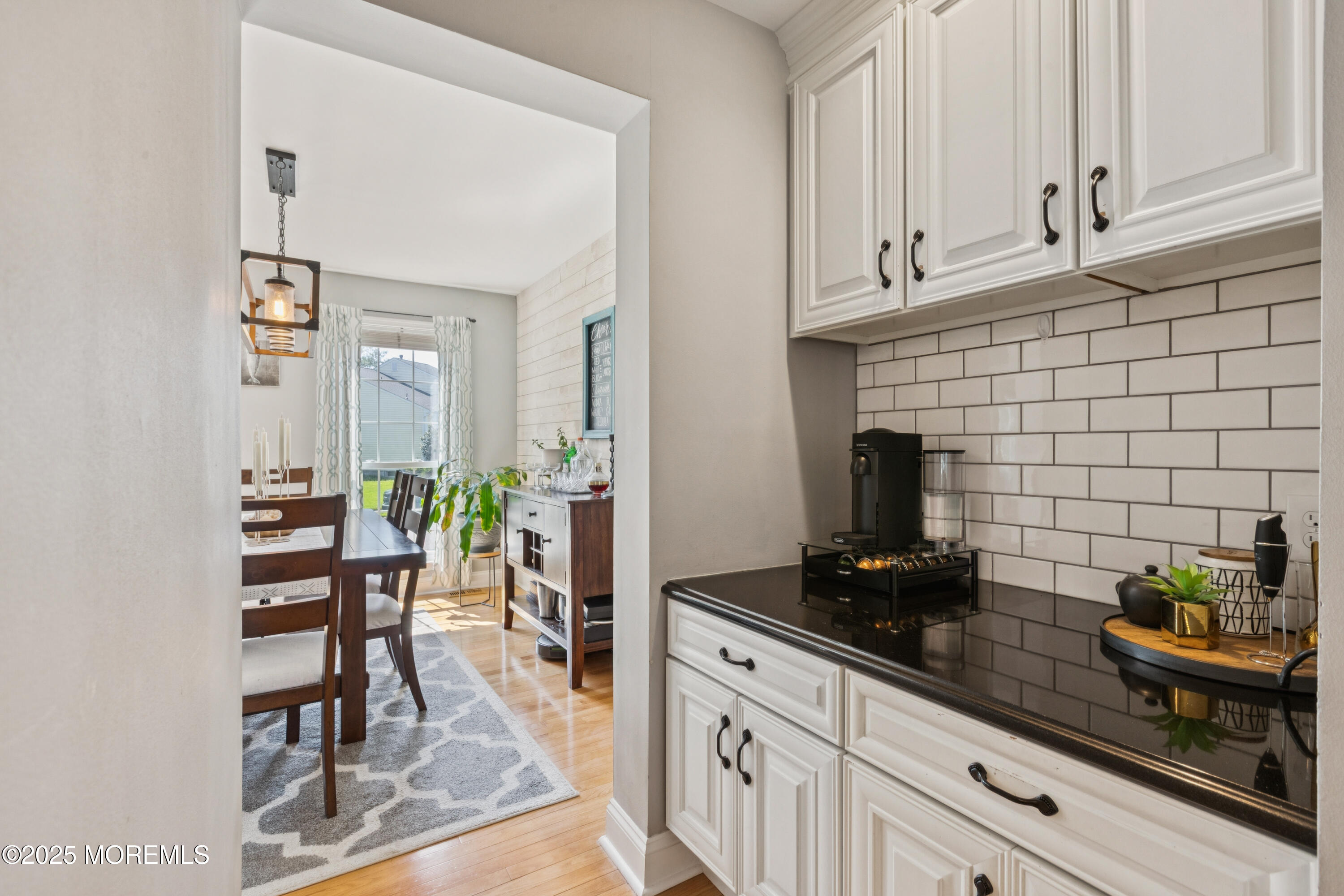 43 Sweet Gum Road Howell, NJ 07731 - Photo 11 of 48 a kitchen with stainless steel appliances a counter top space cabinets and furniture
