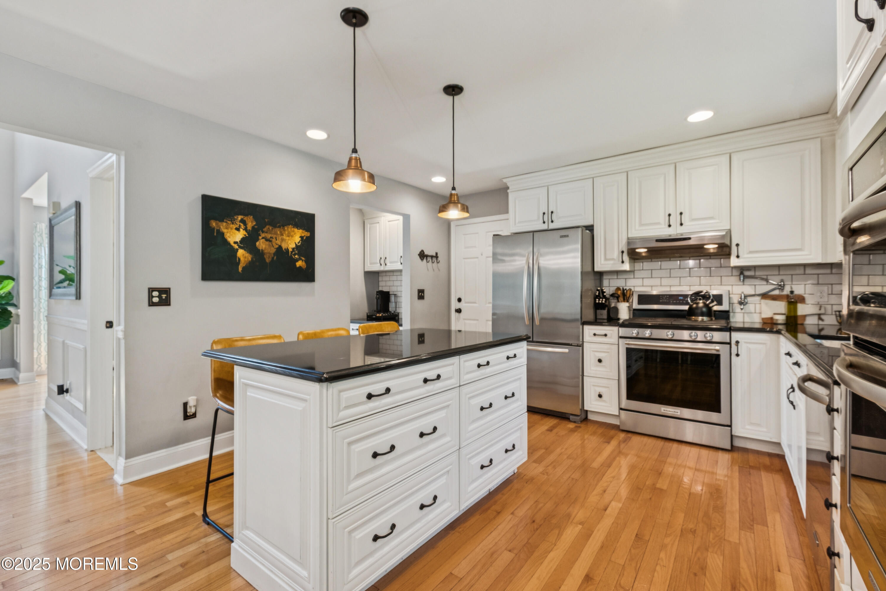 43 Sweet Gum Road Howell, NJ 07731 - Photo 15 of 48 a kitchen with granite countertop a stove oven and refrigerator