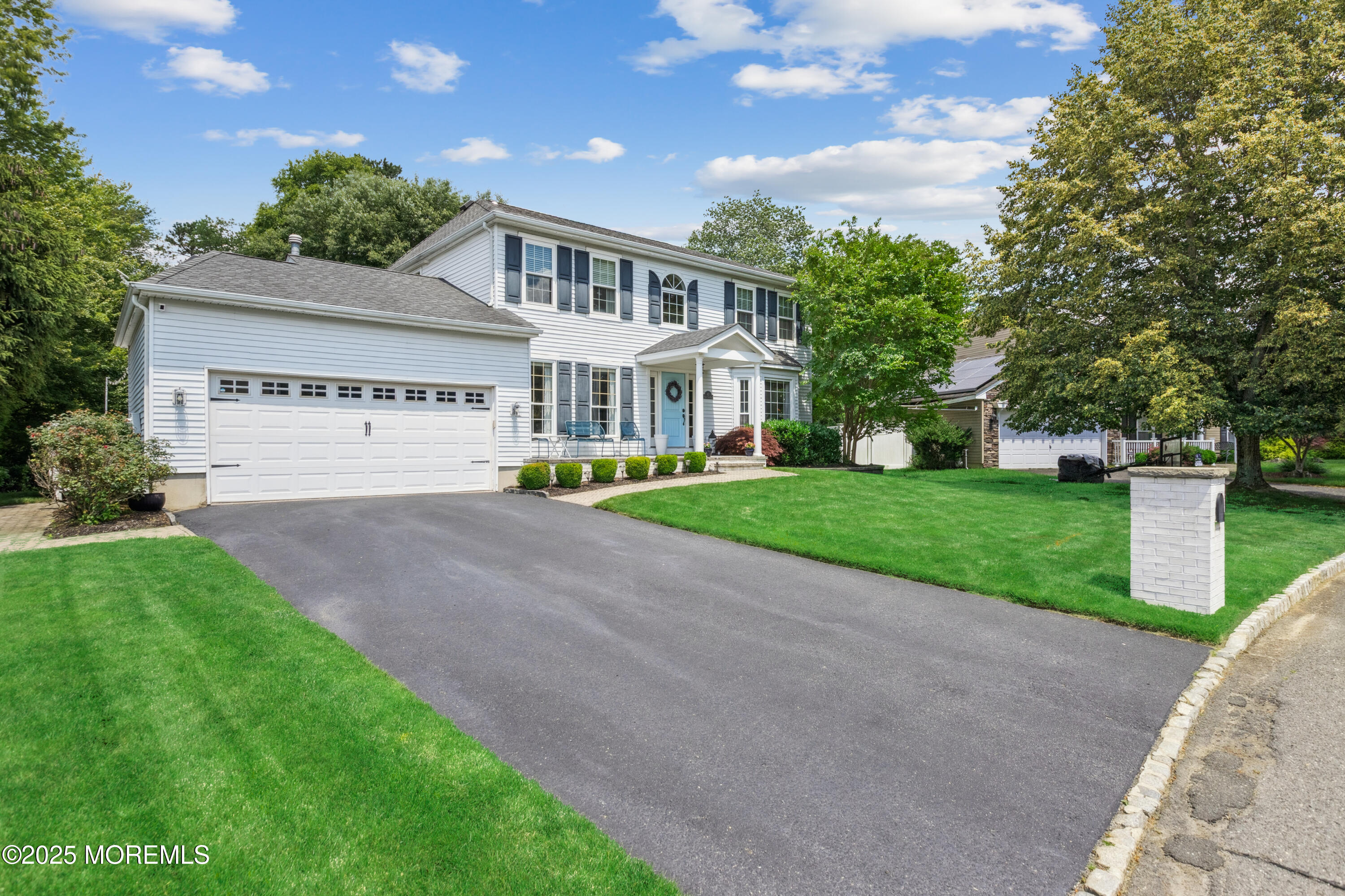 43 Sweet Gum Road Howell, NJ 07731 - Photo 2 of 48 a view of house with a yard and potted plants