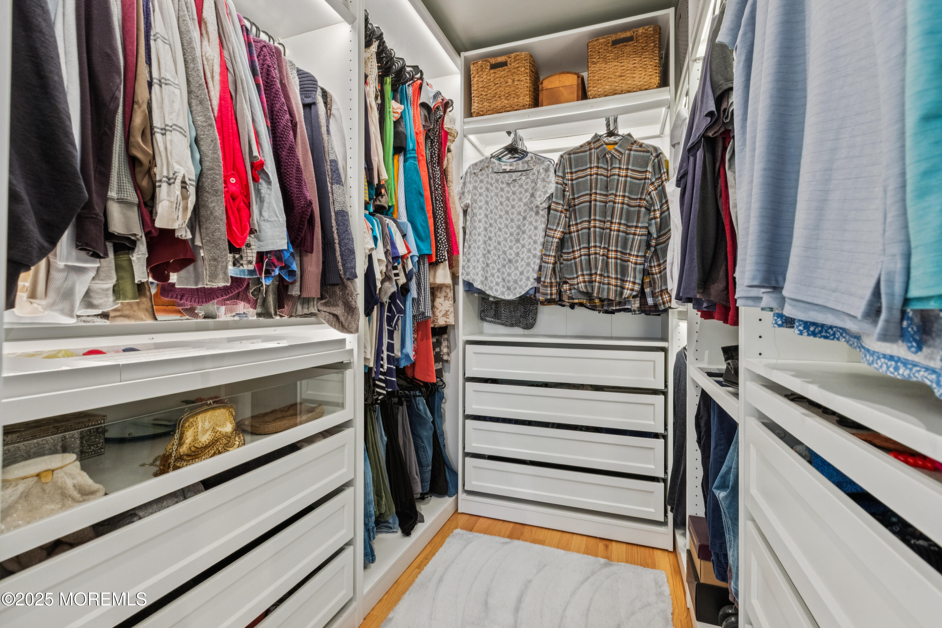 43 Sweet Gum Road Howell, NJ 07731 - Photo 27 of 48 a view of walk in closet with clothes and shoes