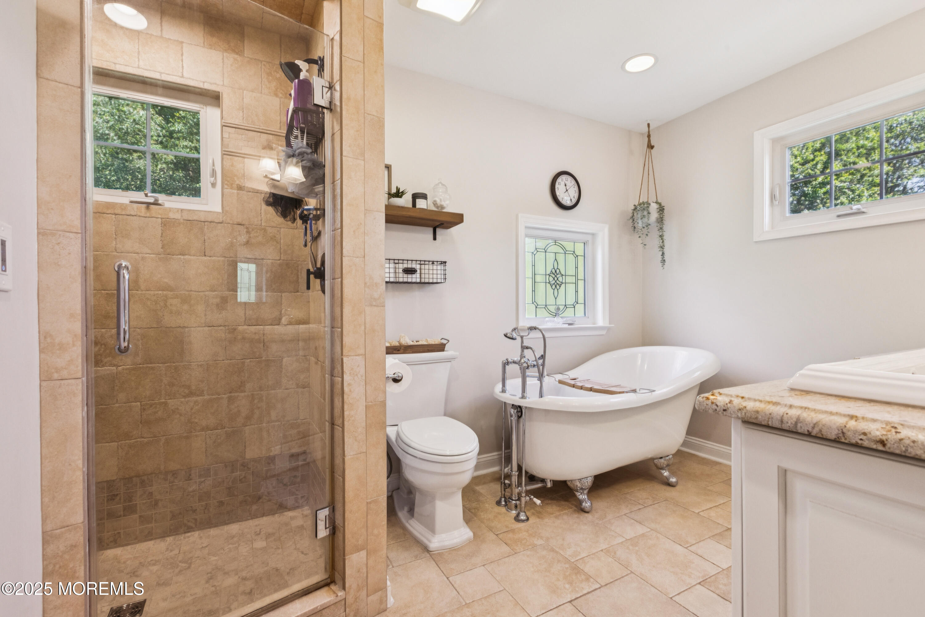 43 Sweet Gum Road Howell, NJ 07731 - Photo 28 of 48 a bathroom with a granite countertop toilet a sink a mirror and a shower