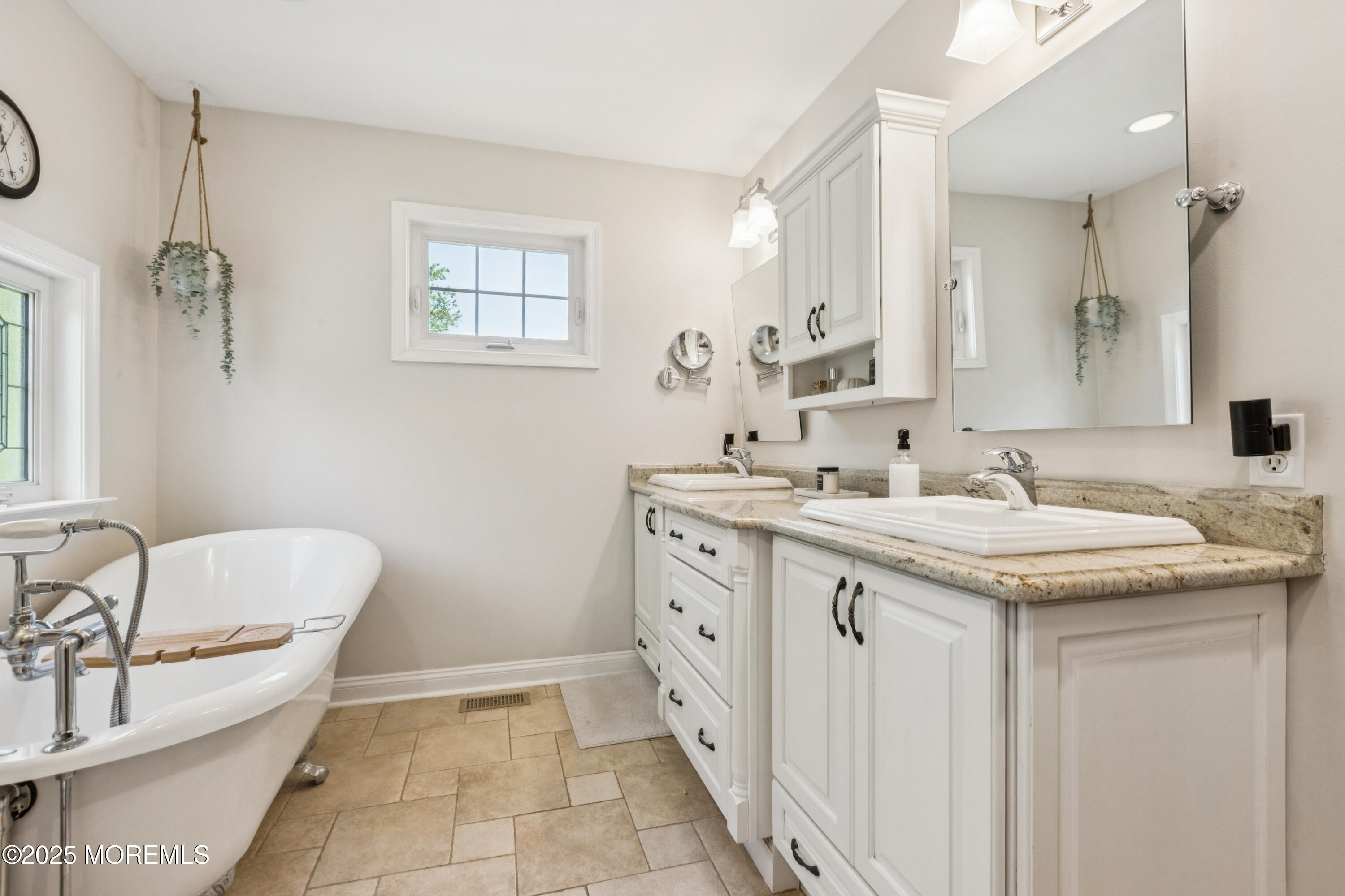 43 Sweet Gum Road Howell, NJ 07731 - Photo 30 of 48 a spacious bathroom with a granite countertop sink a mirror and a