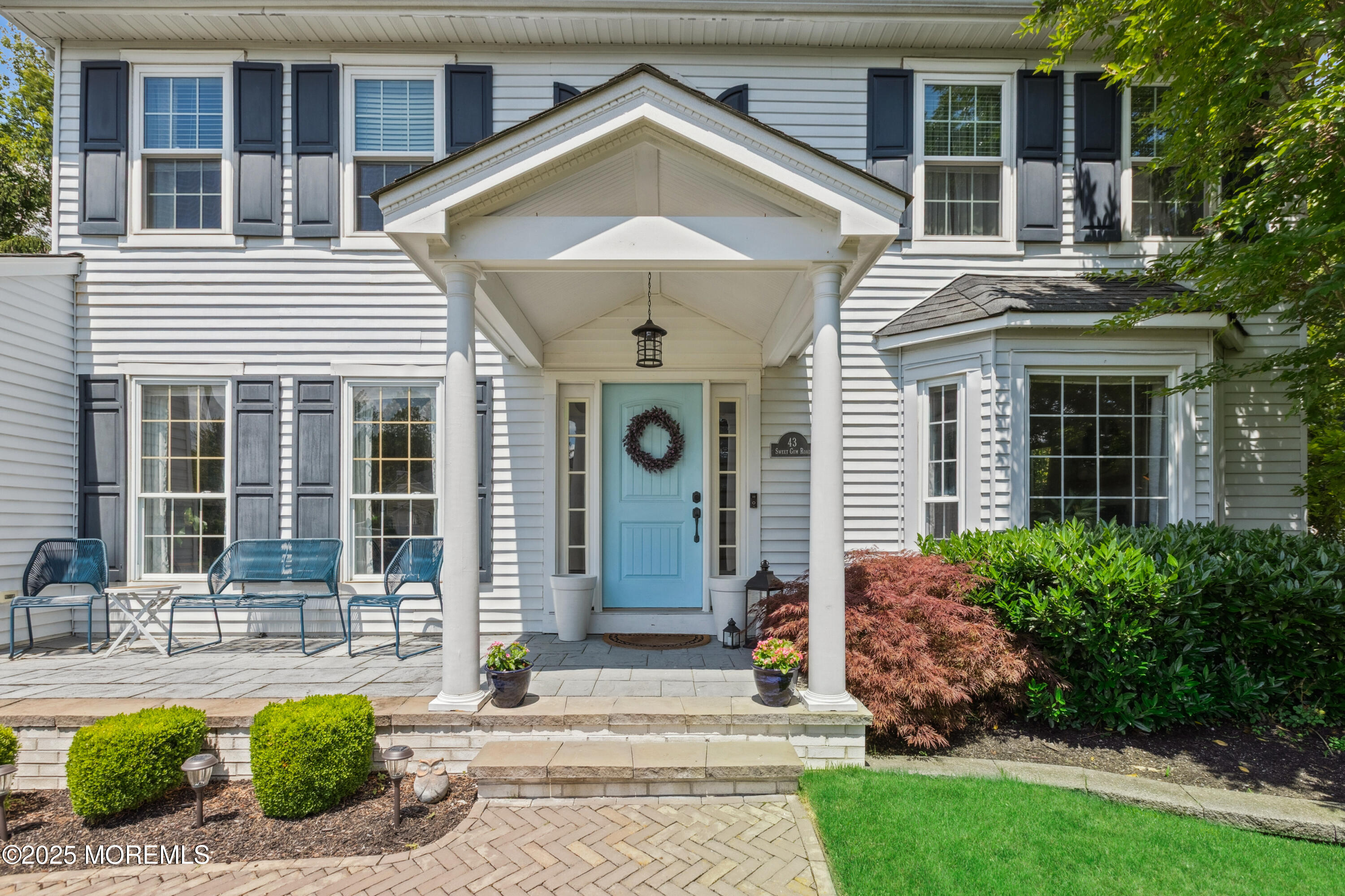 43 Sweet Gum Road Howell, NJ 07731 - Photo 3 of 48 a front view of a house with garden
