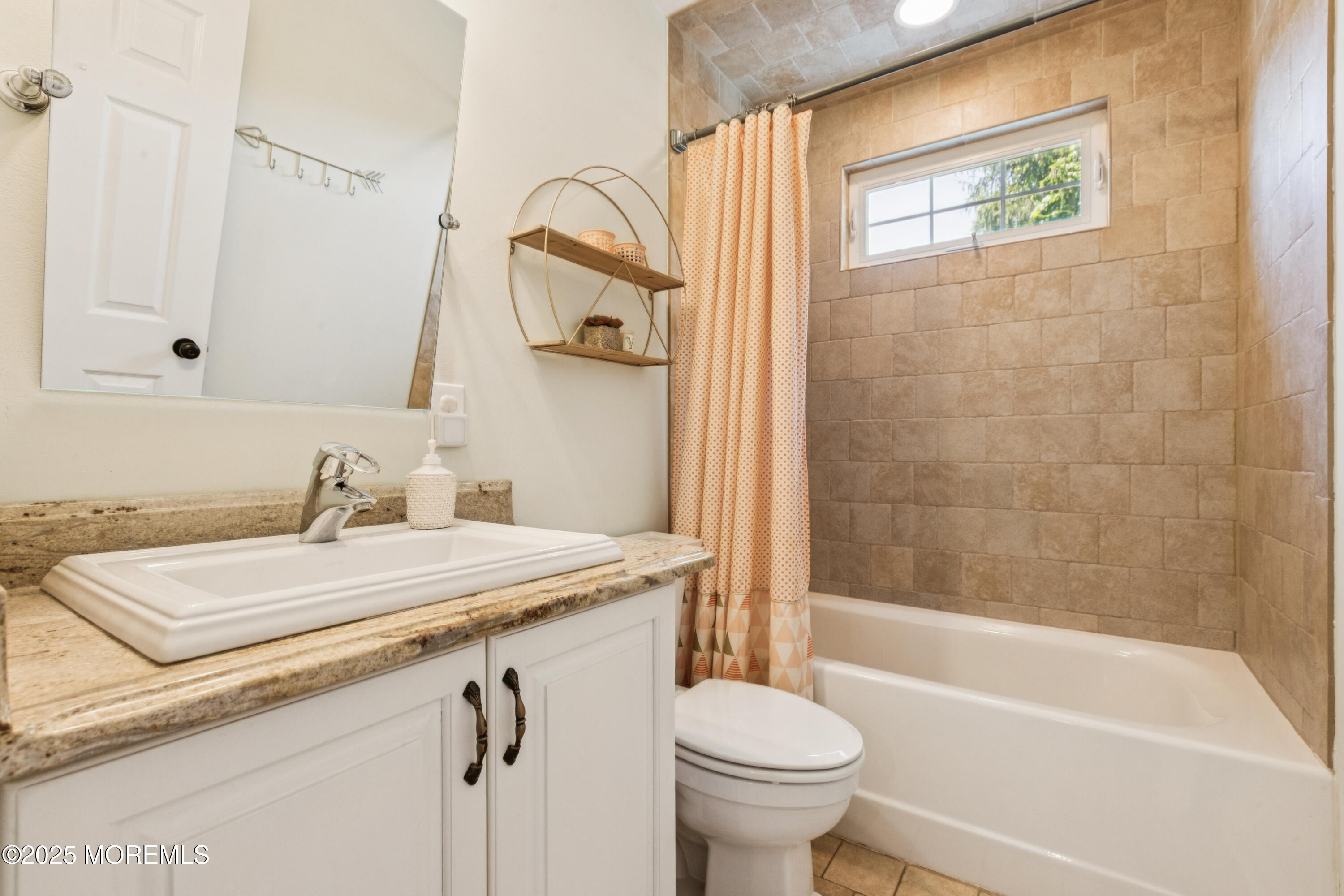 43 Sweet Gum Road Howell, NJ 07731 - Photo 35 of 48 a bathroom with a sink a toilet and a bathtub