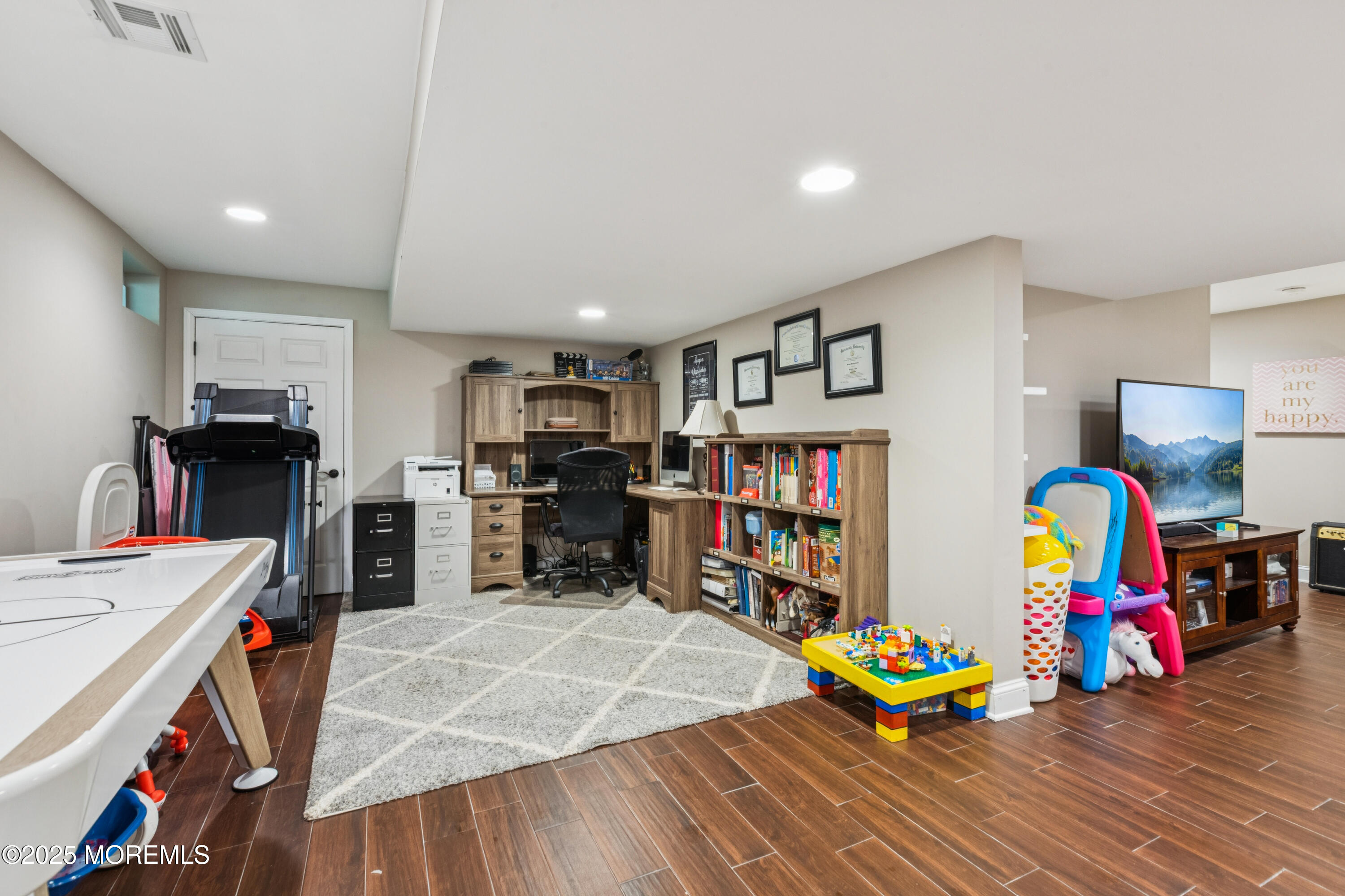 43 Sweet Gum Road Howell, NJ 07731 - Photo 38 of 48 a room with furniture and wooden floor