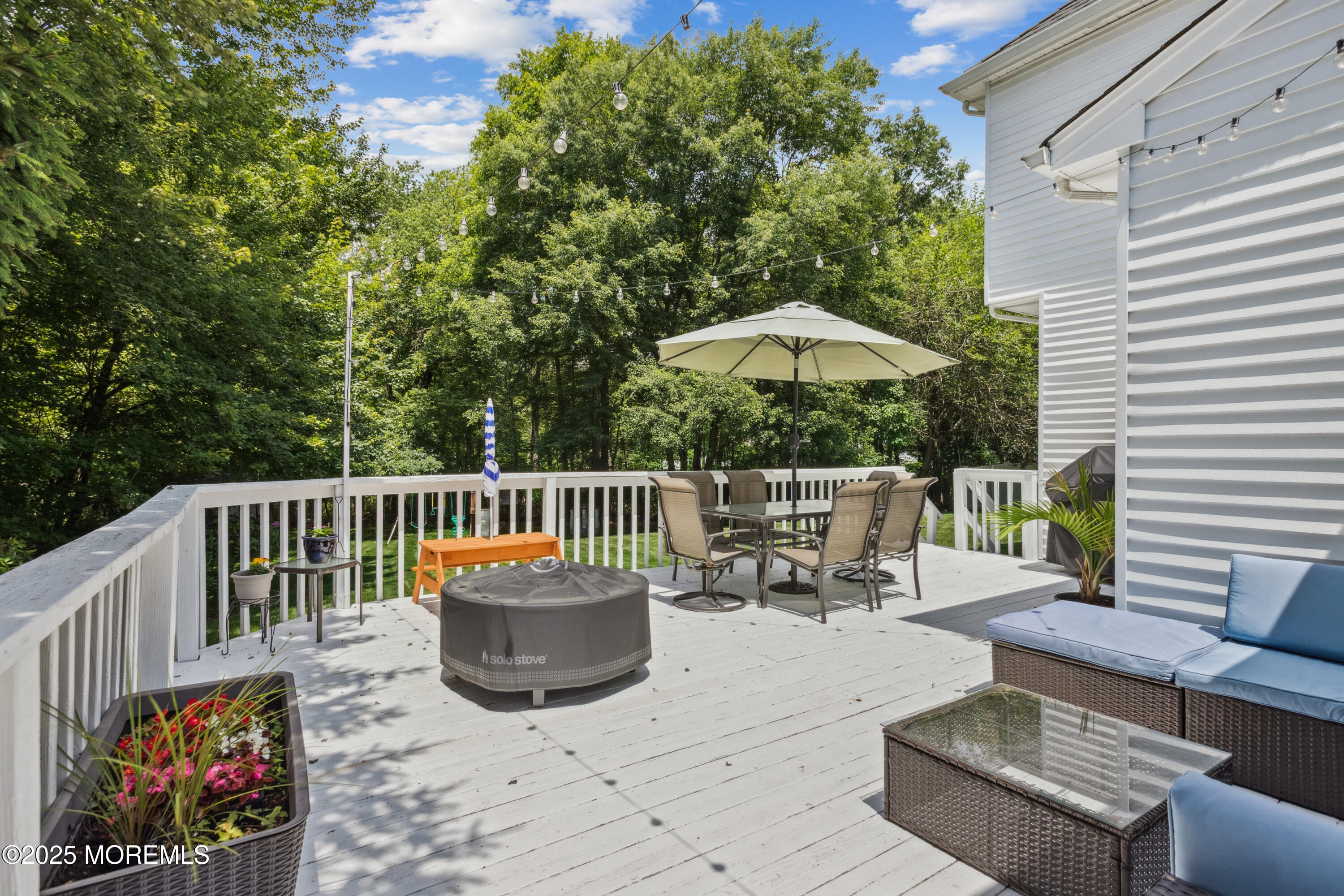 43 Sweet Gum Road Howell, NJ 07731 - Photo 43 of 48 a view of a chair and tables