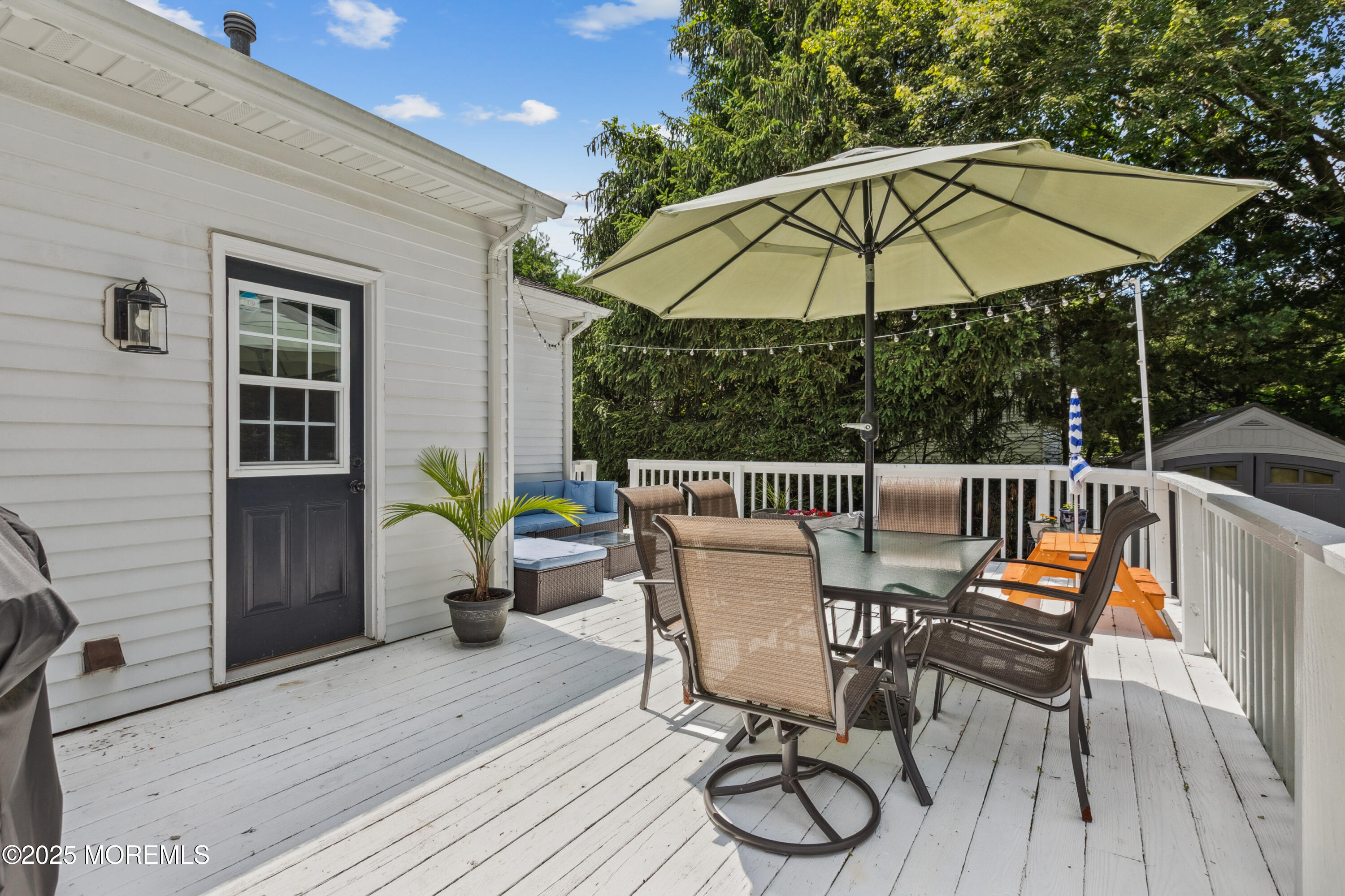 43 Sweet Gum Road Howell, NJ 07731 - Photo 44 of 48 a view of a chair and table on the wooden floor