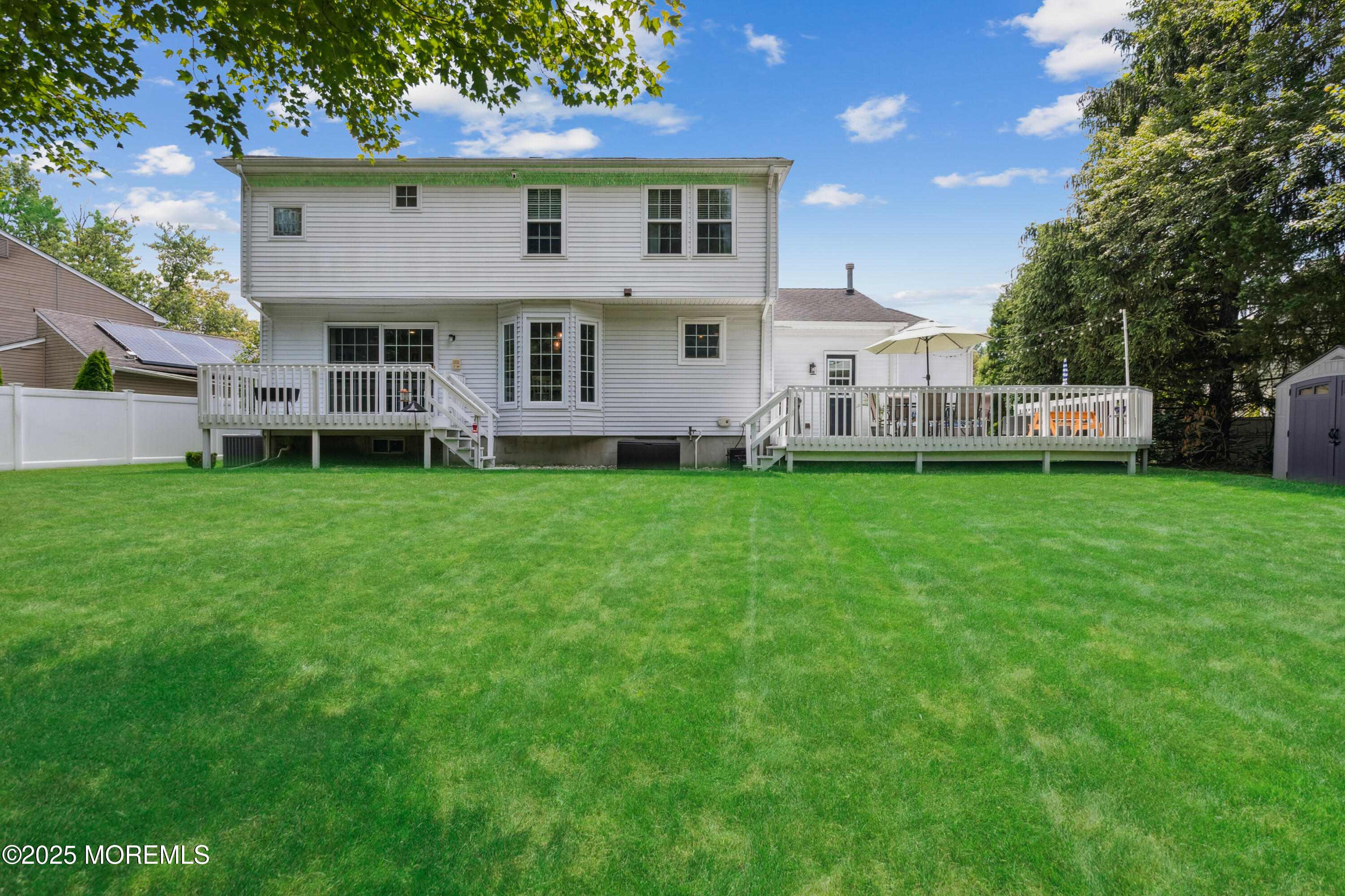 43 Sweet Gum Road Howell, NJ 07731 - Photo 45 of 48 a view of a house with a yard and sitting area