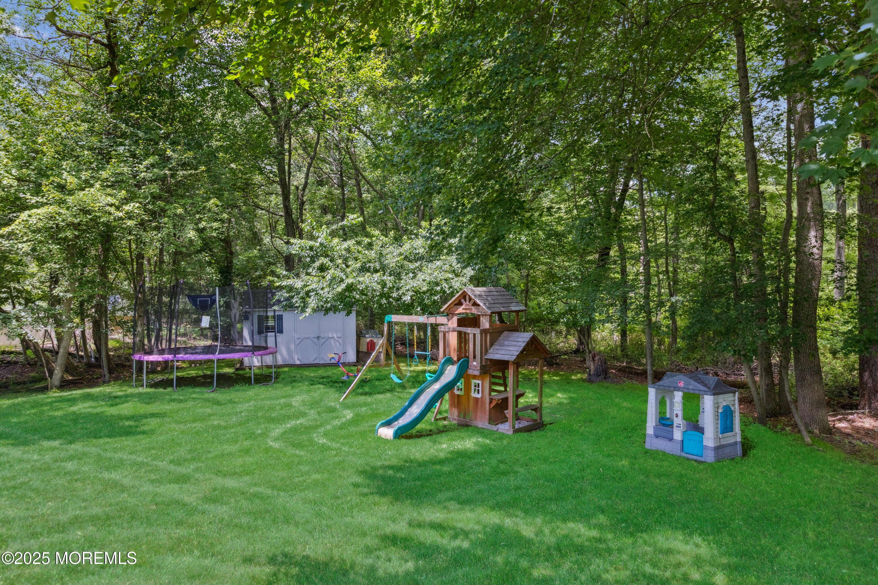 43 Sweet Gum Road Howell, NJ 07731 - Photo 48 of 48 a view of a park with swings and a slide