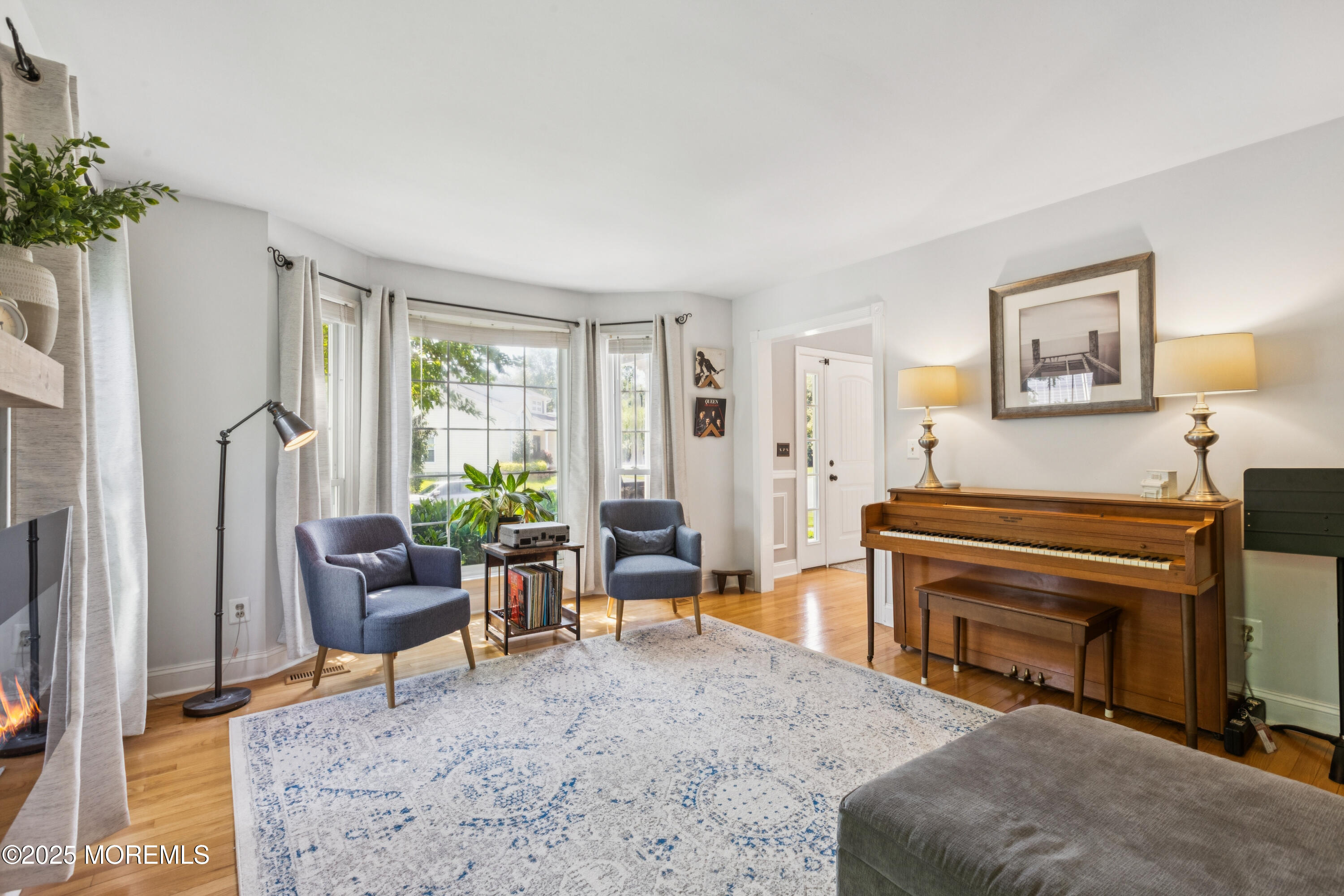 43 Sweet Gum Road Howell, NJ 07731 - Photo 8 of 48 a living room with furniture and a piano