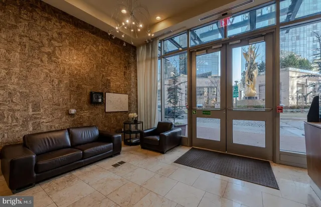 a view of a terrace with sitting area