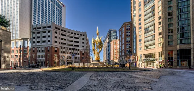 a view of a building with sitting area