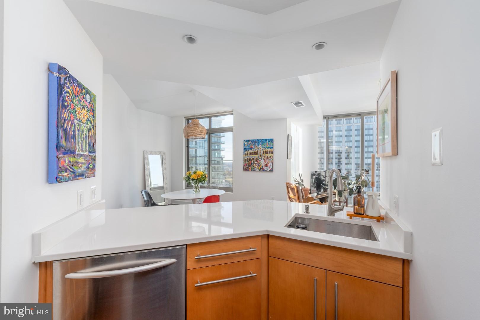 675 President Street, Unit 2402 Baltimore, MD 21202 - Photo 6 of 27 a kitchen with a sink and cabinets