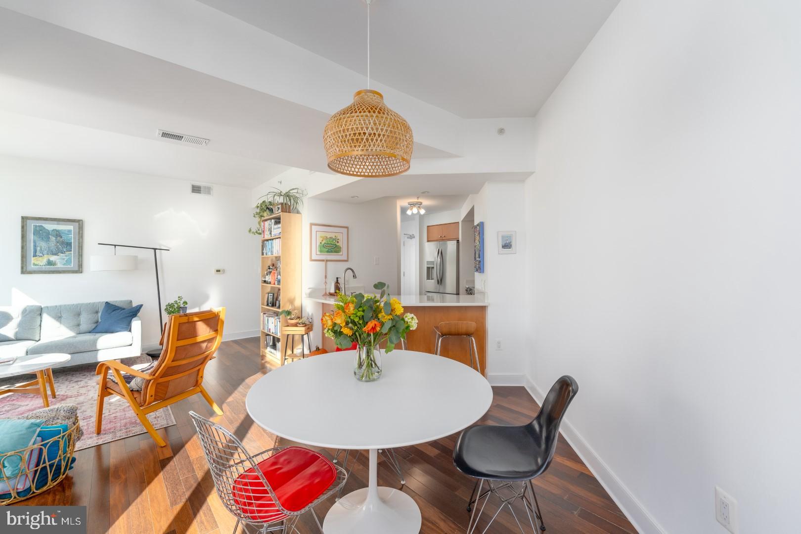 675 President Street, Unit 2402 Baltimore, MD 21202 - Photo 10 of 27 a view of a dining room with furniture