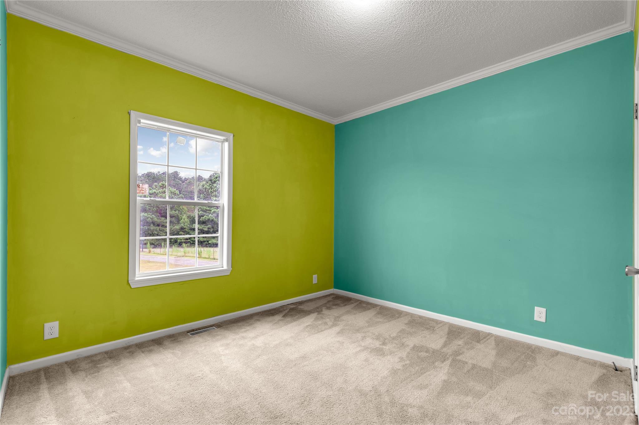 3052 Zeb Deese Road Lancaster, SC 29720 - Photo 17 of 34 a view of an empty room with a window