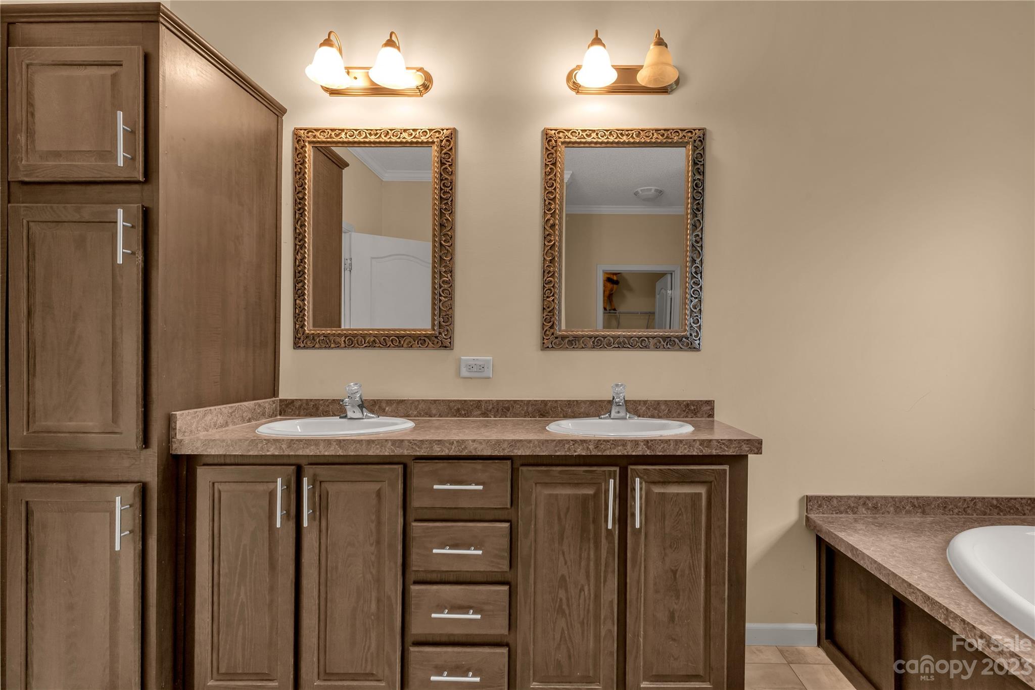3052 Zeb Deese Road Lancaster, SC 29720 - Photo 20 of 34 a bathroom with a sink and a mirror