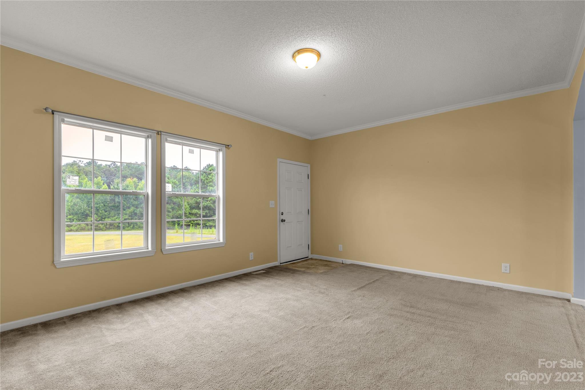 3052 Zeb Deese Road Lancaster, SC 29720 - Photo 6 of 34 an empty room with a window