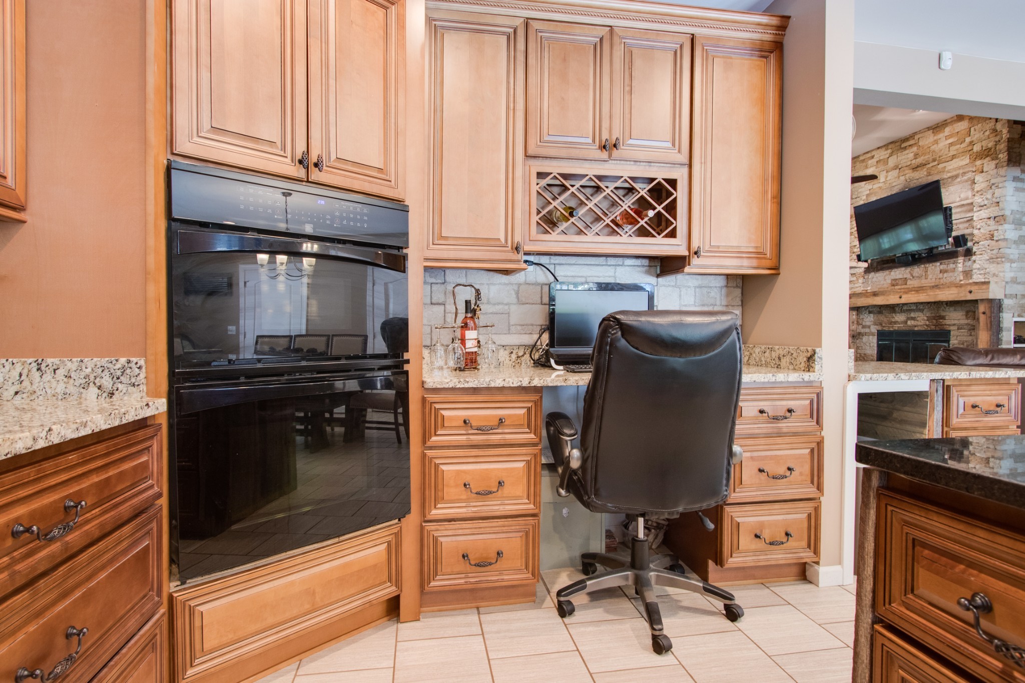725 Fowler Ford Road Portland, TN 37148 - Photo 13 of 35 a kitchen with stainless steel appliances granite countertop a stove and a refrigerator