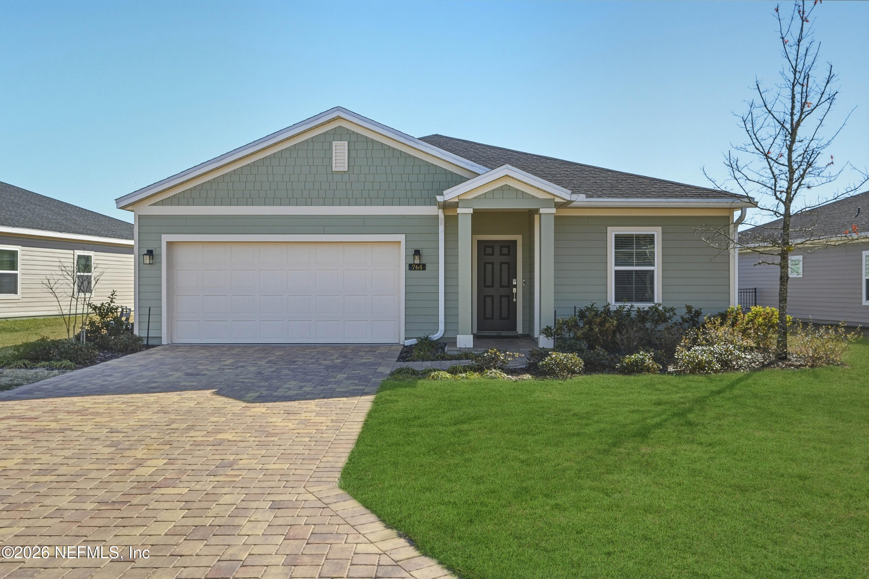 764 Lake Sinclair Street St. Augustine, FL 32084 - Photo 10 of 45 a front view of house with yard and green space