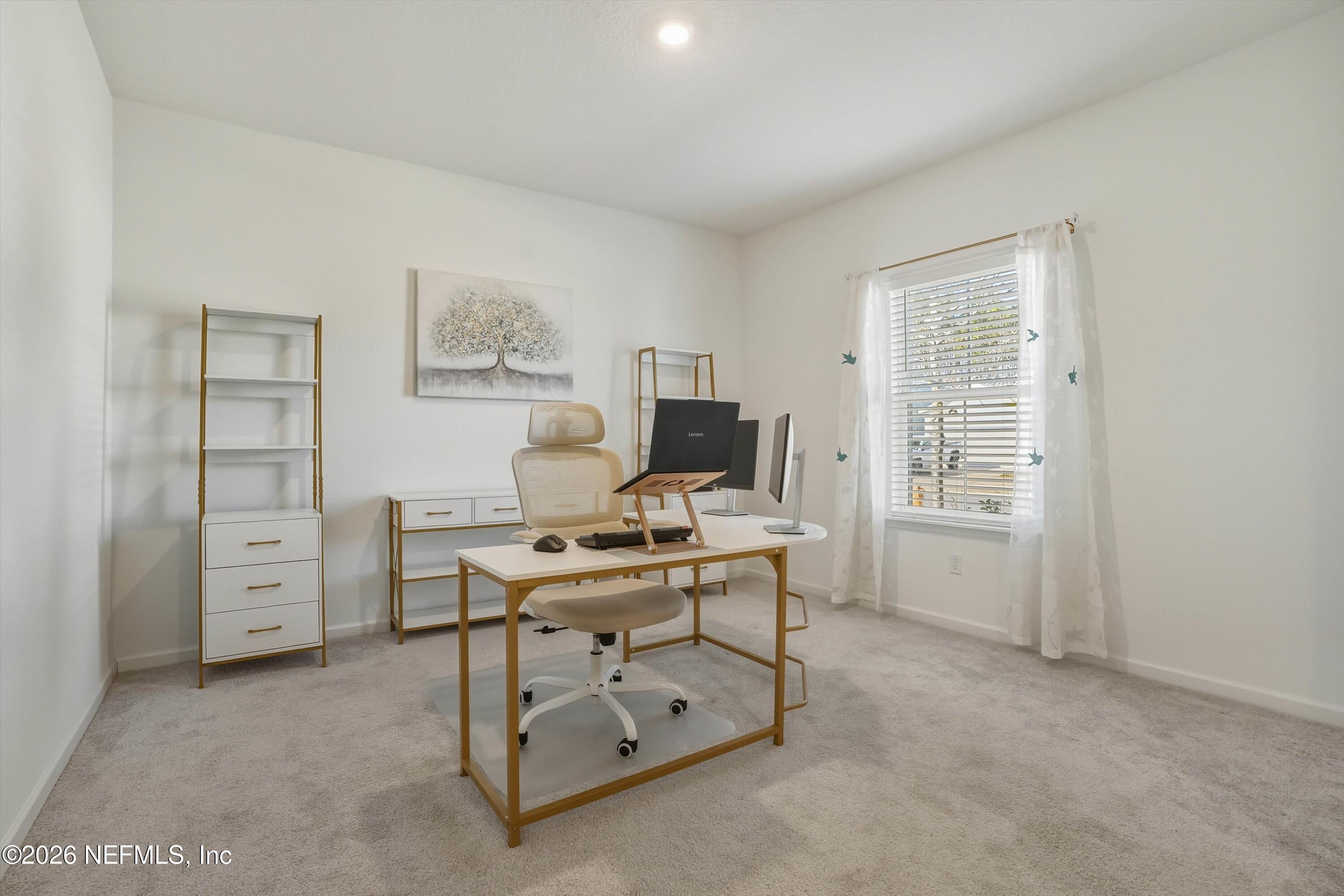 764 Lake Sinclair Street St. Augustine, FL 32084 - Photo 12 of 45 a view of a workspace with furniture
