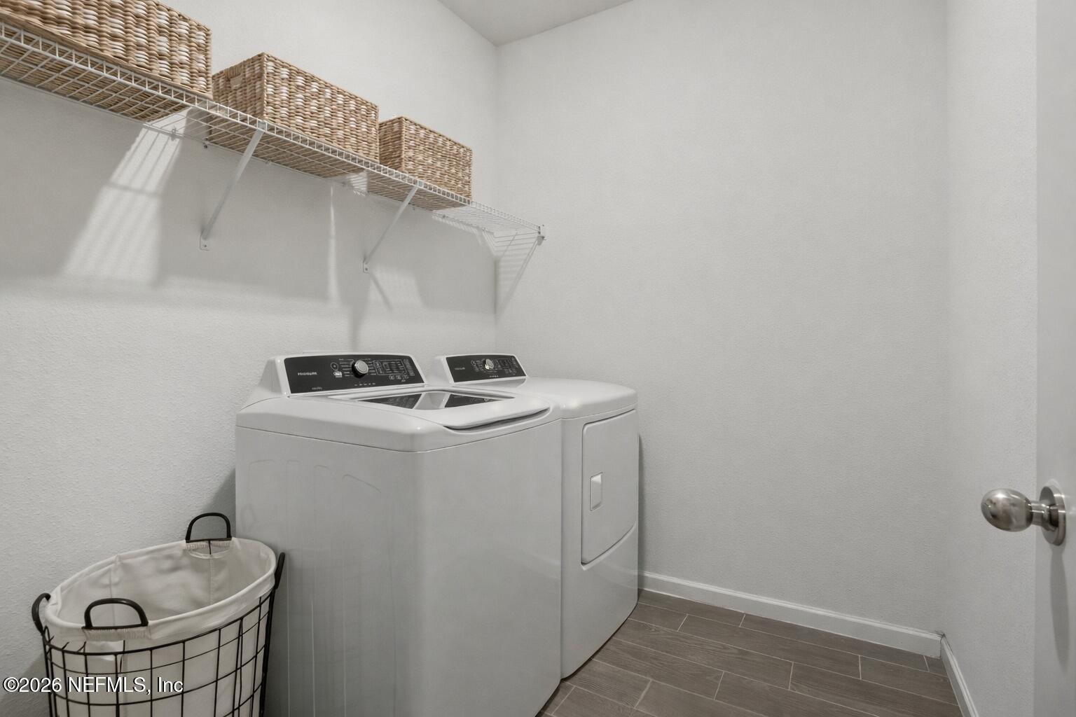 764 Lake Sinclair Street St. Augustine, FL 32084 - Photo 22 of 45 a utility room with dryer and washer