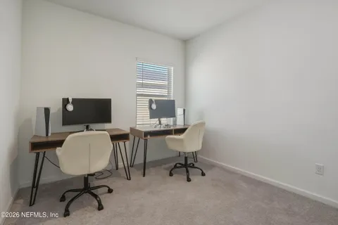 a bedroom with a bed and a cabinets