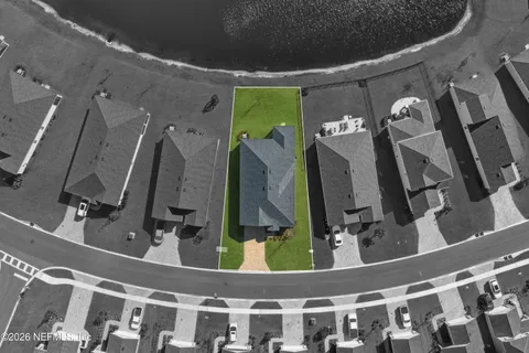 a view of gym equipment and a mirror