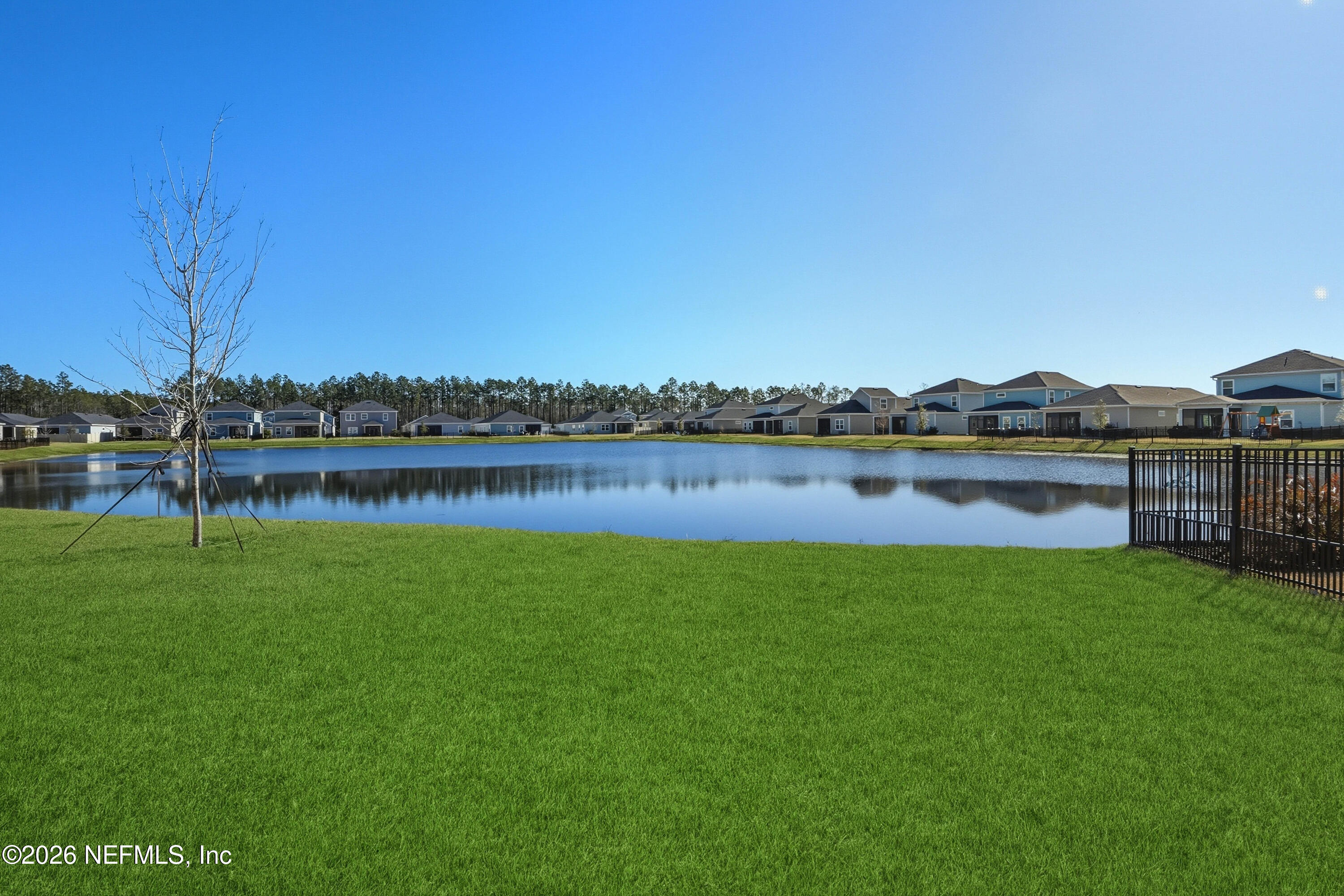 764 Lake Sinclair Street St. Augustine, FL 32084 - Photo 8 of 45 a view of a lake with houses