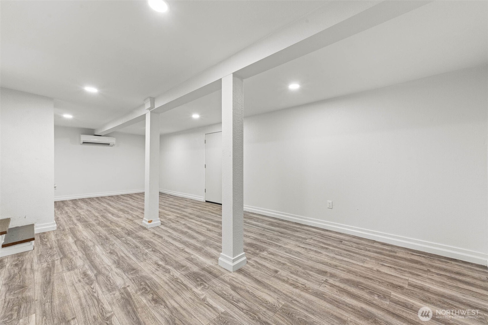172 South Bank Road Elma, WA 98541 - Photo 32 of 40 a view of an empty room with wooden floor
