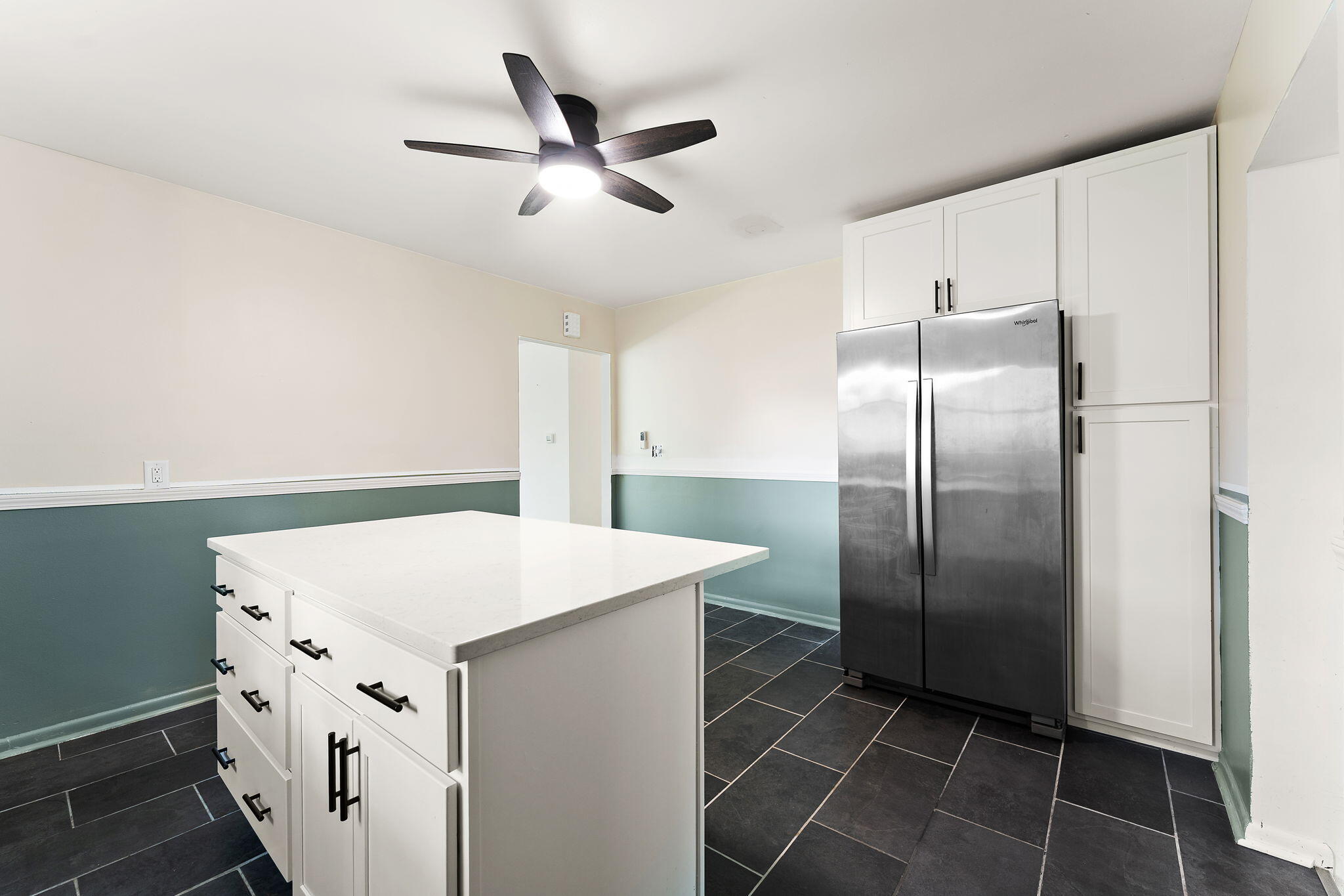 2201 Ade Avenue Valparaiso, IN 46383 - Photo 13 of 20 a kitchen with a refrigerator a sink and cabinets