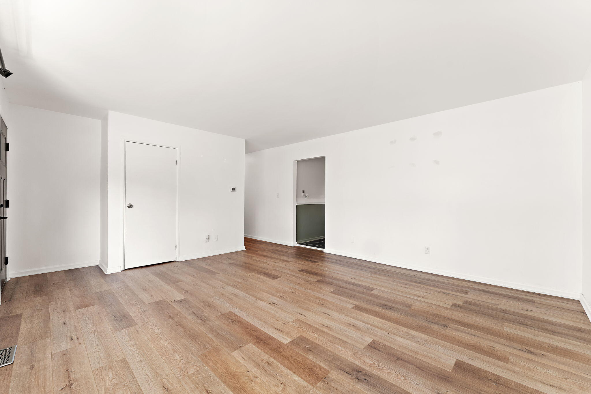 2201 Ade Avenue Valparaiso, IN 46383 - Photo 4 of 20 a view of an empty room with wooden floor