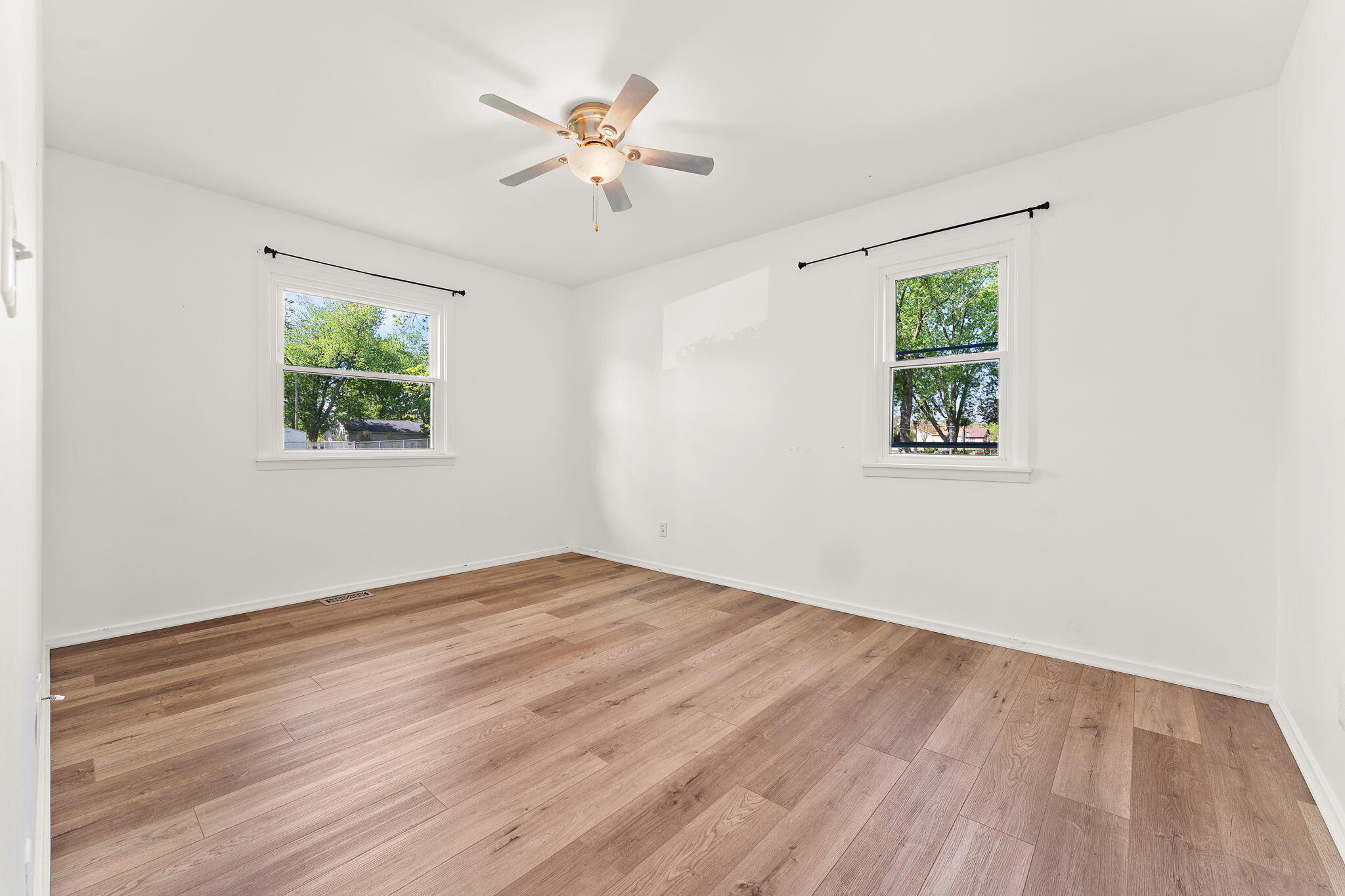 2201 Ade Avenue Valparaiso, IN 46383 - Photo 8 of 20 a view of empty room with wooden floor and fan