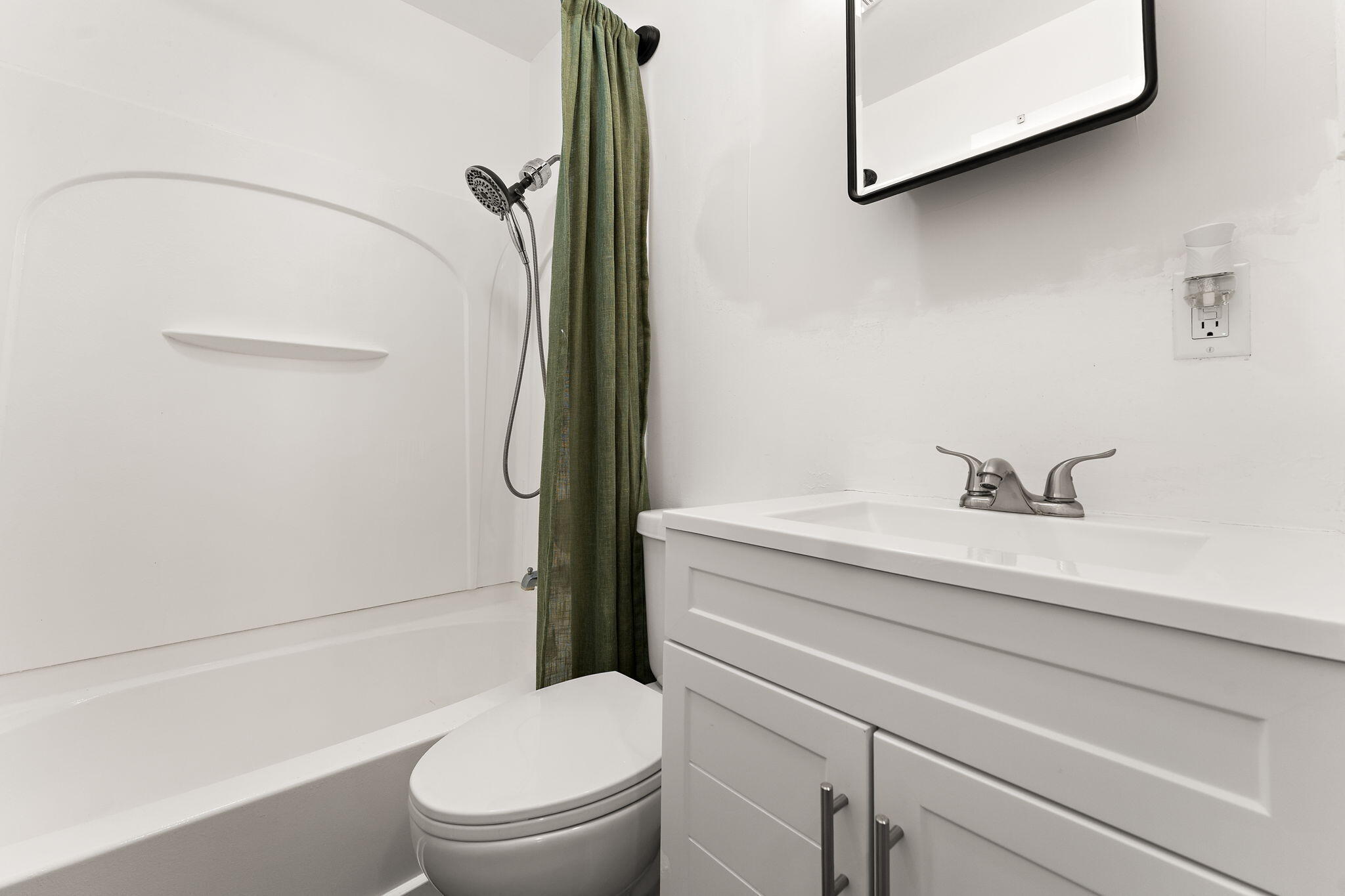2201 Ade Avenue Valparaiso, IN 46383 - Photo 10 of 20 a bathroom with a sink a toilet and shower
