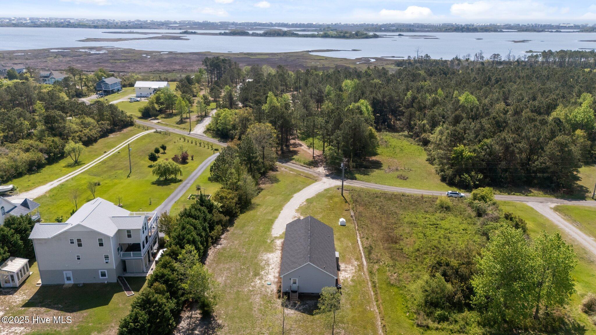 138 Heron Cove Road Hampstead, NC 28443 - Photo 10 of 58 10-web-or-mls-DJI_20250415111126_0403_D